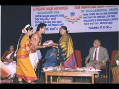 Receiving honours from Smt. Leeladevi R. Prasad, Kannada & Culture Minister of Karnataka